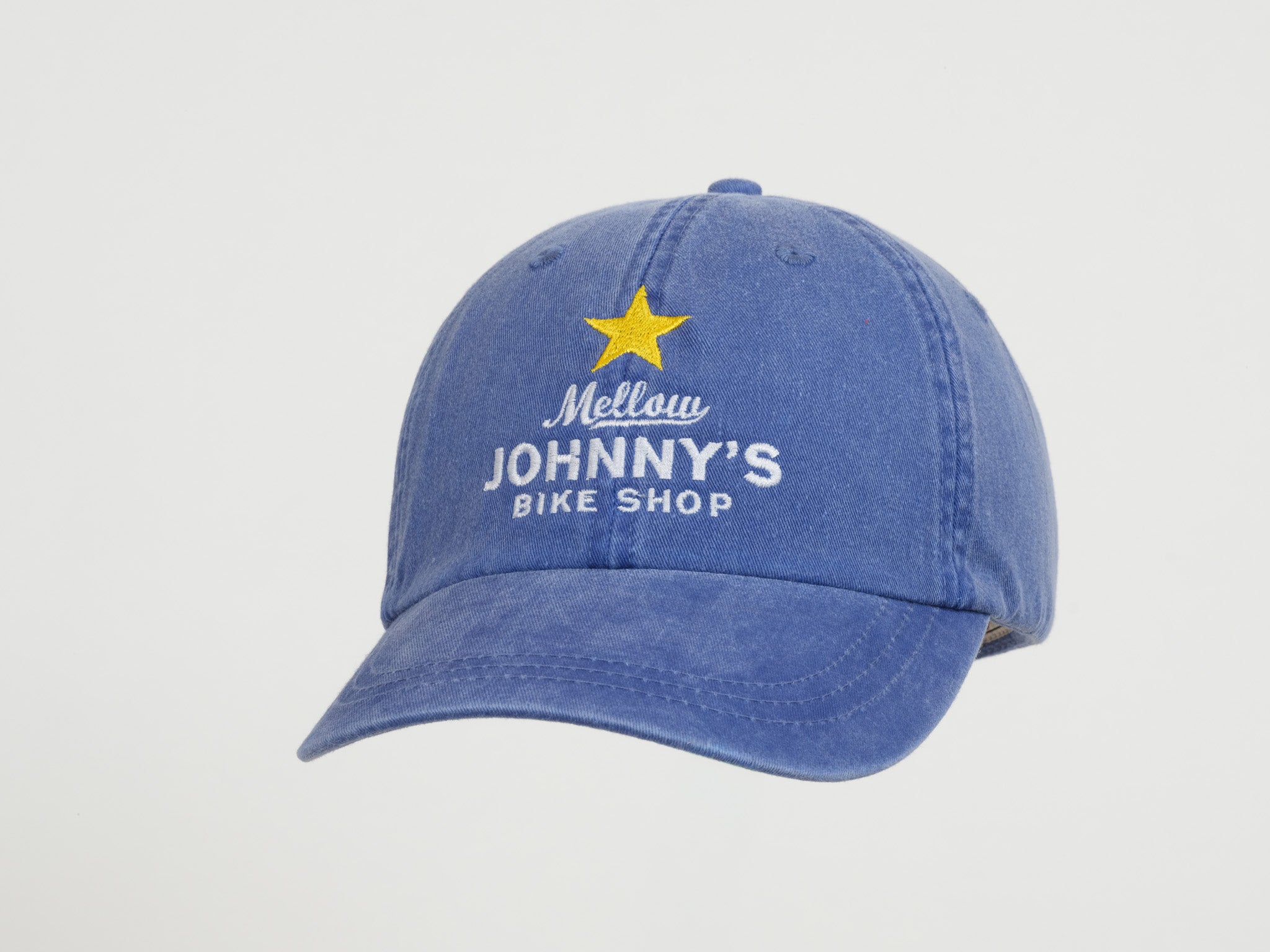 Blue cap with 'Mellow Johnny's Bike Shop' logo on a light gray background