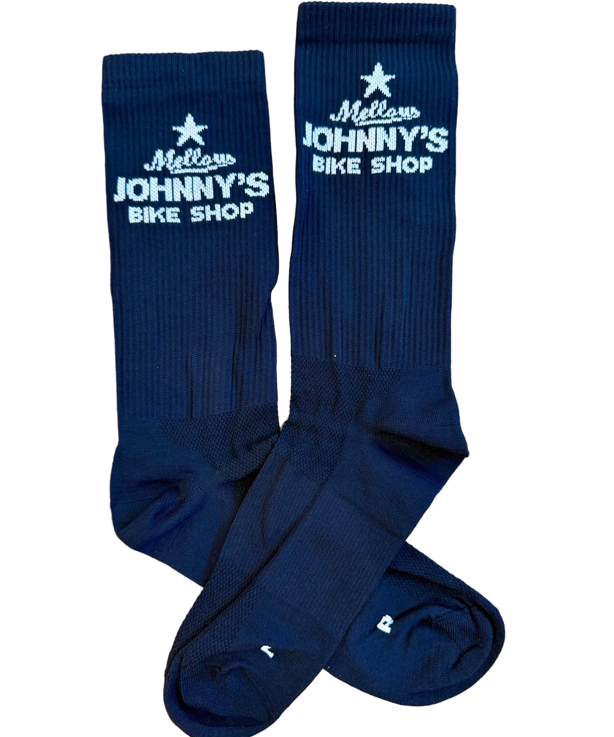 A pair of black crew socks with white embroidered text reading 'Mellow Johnny's Bike Shop' and a star logo, laid flat on a white background.