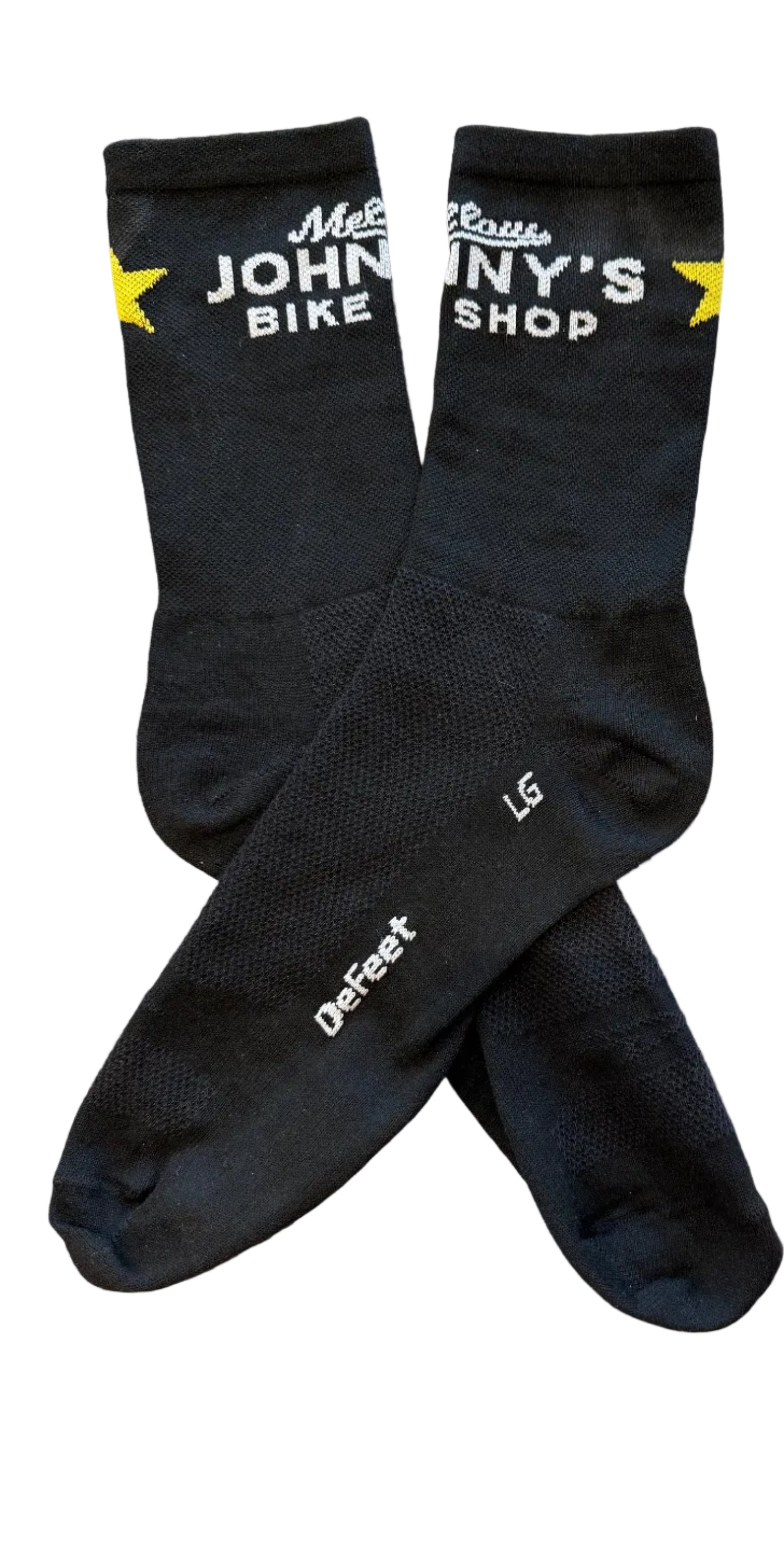 Black socks with branding on a wooden surface