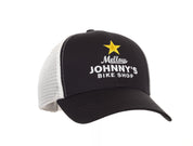 A black and white mesh snapback trucker hat with 'Mellow Johnny's Bike Shop' logo on the front.