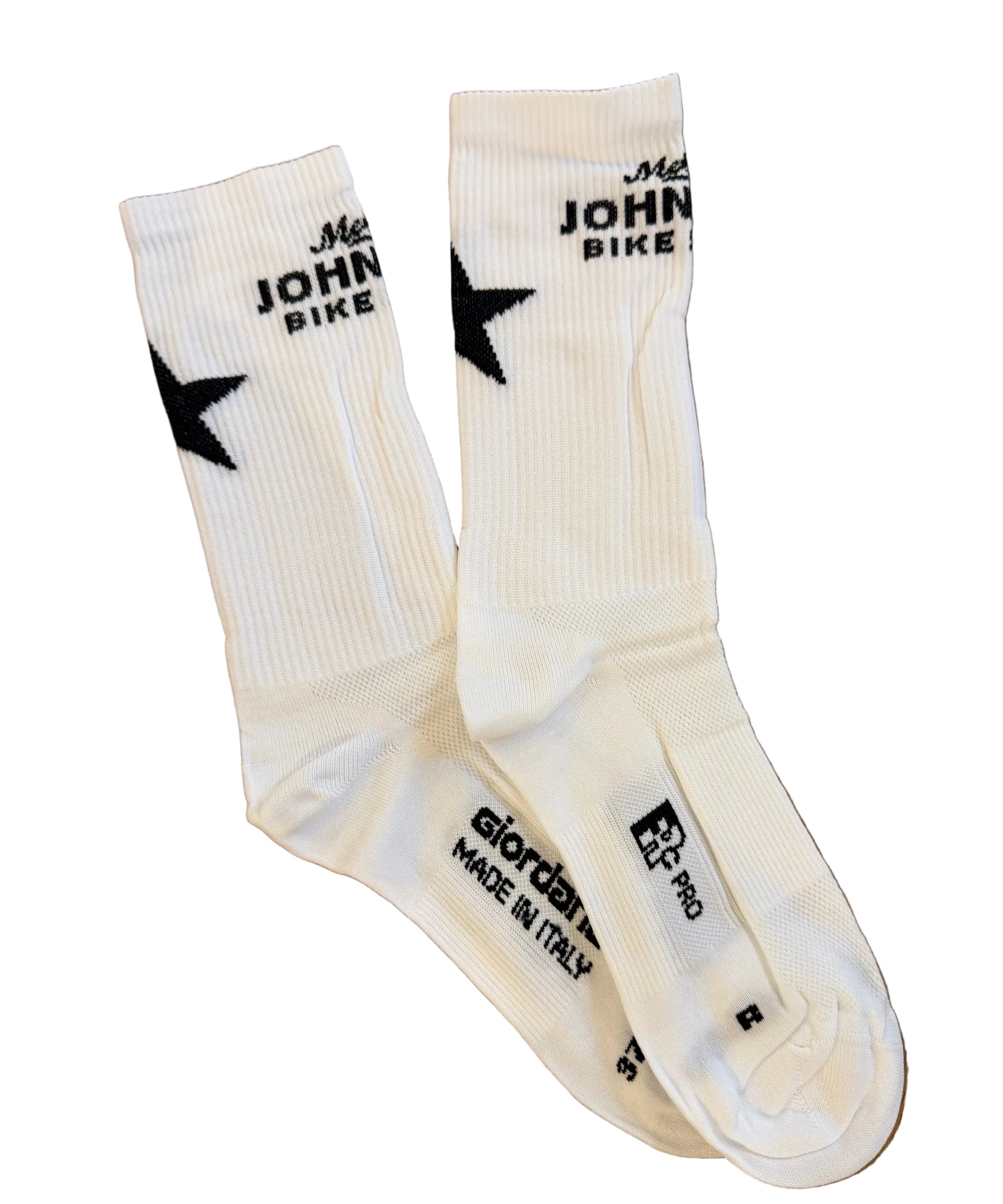A pair of white crew socks laid flat on a white background. The socks feature black printed text Mellow Johnny's Bike Shop