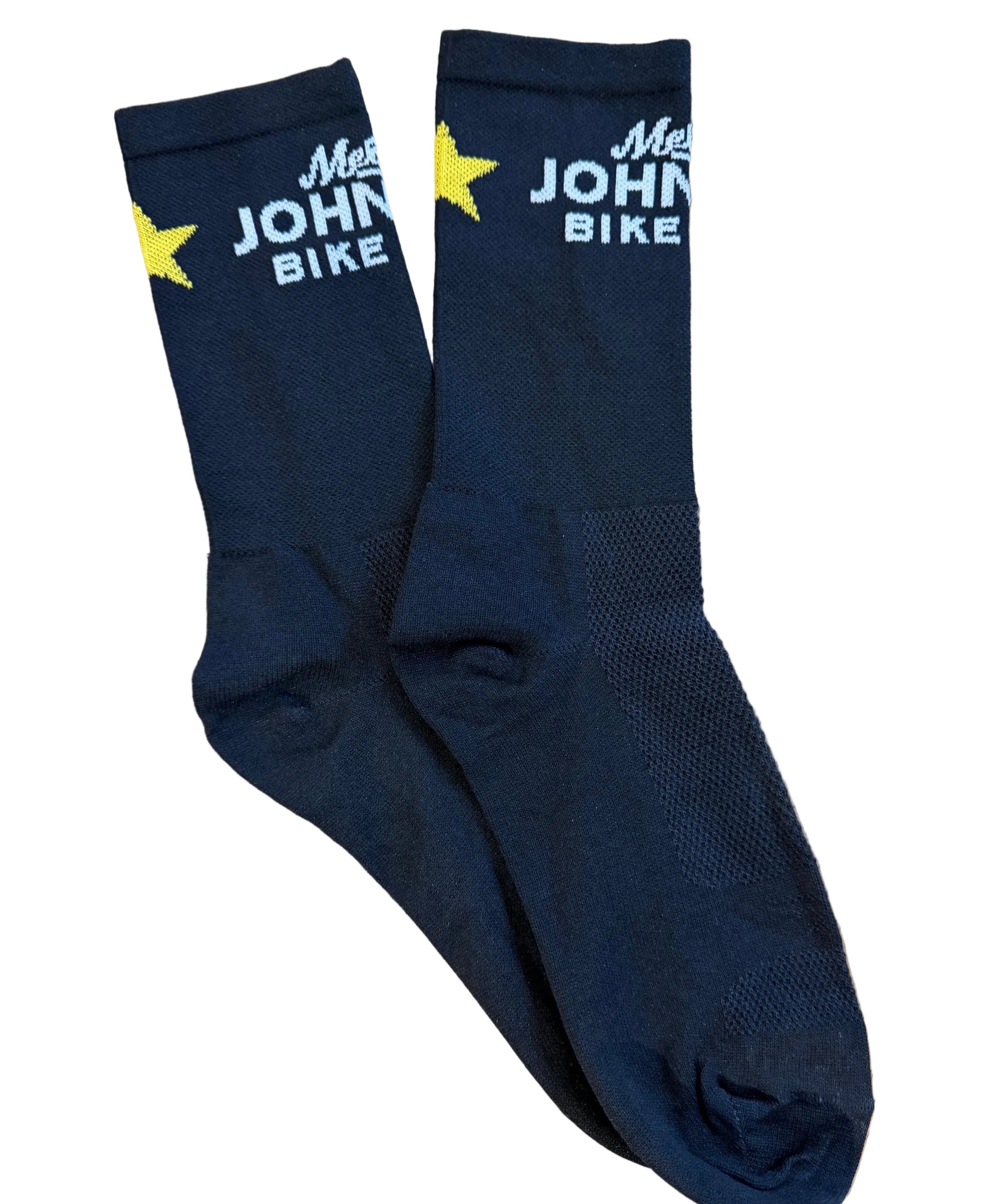 A pair of black crew socks laid flat on a white background, featuring 'Mellow Johnn's Bike Shop' in white text and a yellow star logo near the c